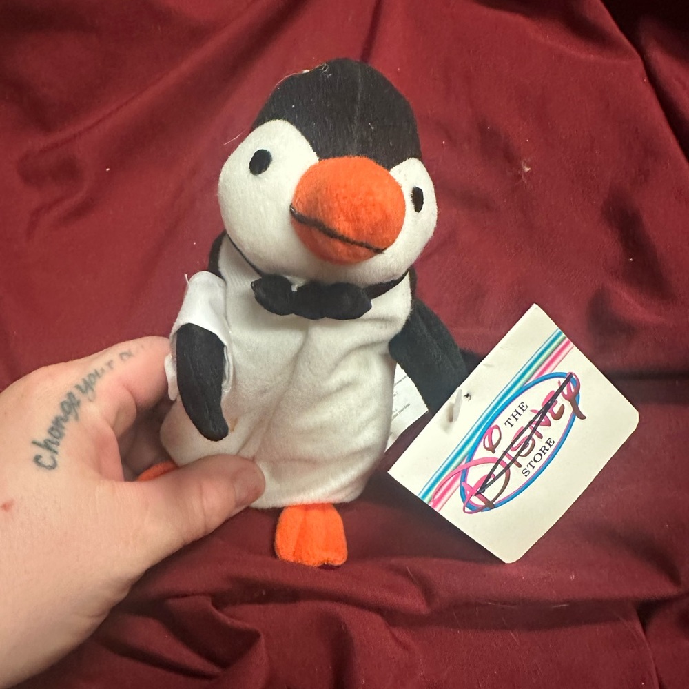 Disney Black and White Penguin Plush with Orange Accents‎